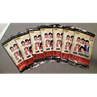 1D One Direction Lot of 7 Factory Sealed Packs - Each Pack Contains 9 Cards and 1 Sticker