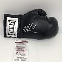 Autographed/Signed Mike Tyson Black Everlast Boxing Glove JSA COA